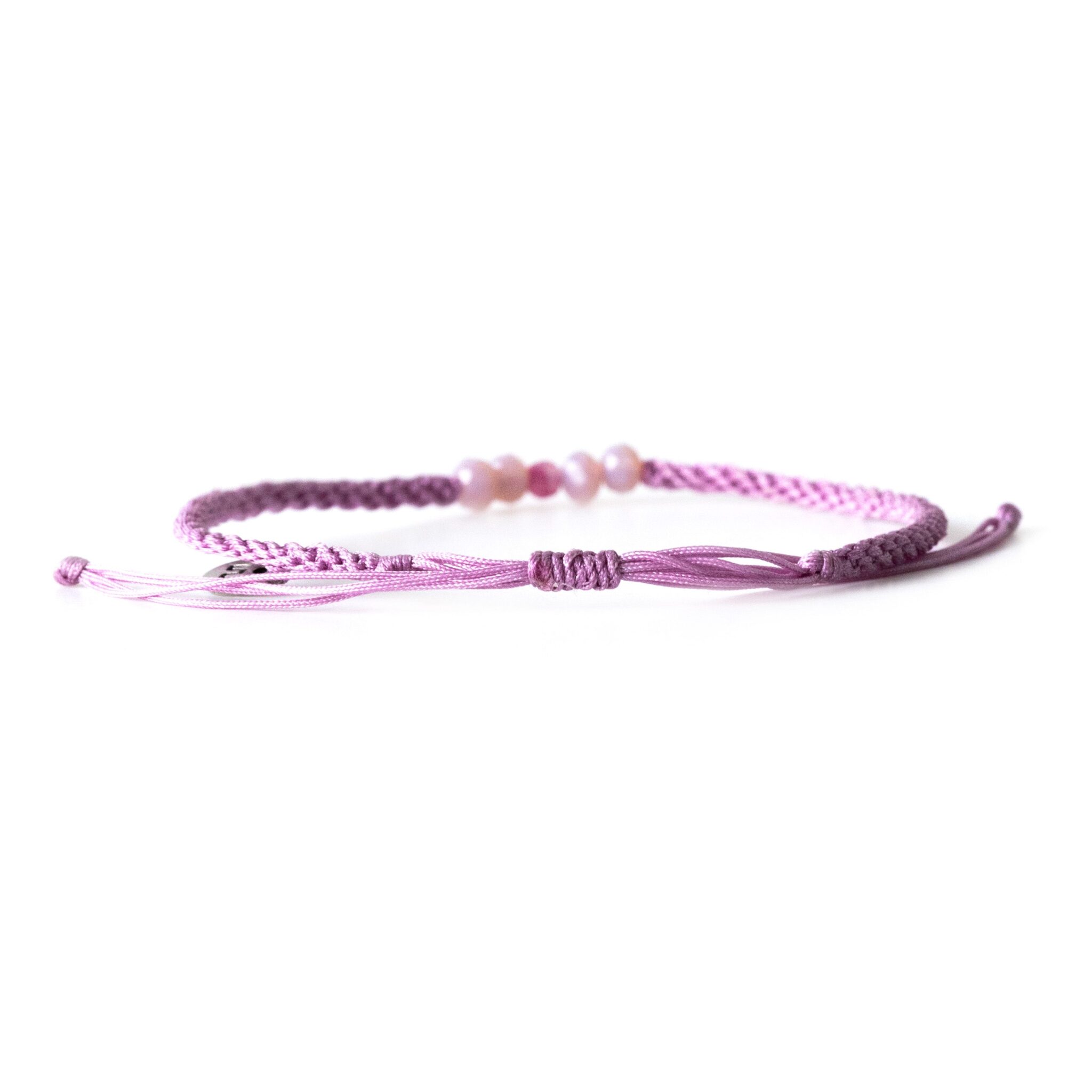 De i mitten – lila 2 Lila armband med rosa stenar§