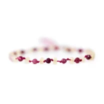 Rosa och lila armband med glasstenar